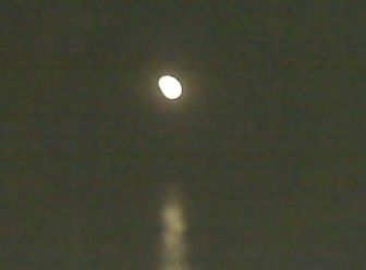 Full moon April '10 2 moon over the water, full moon, planter's moon, peony moon, flower moon, orange moon