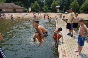 kids in swimming pool, lake, dock