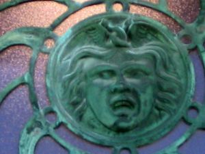 Asbury Park bas relief, copper sun face, carousel