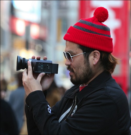 New York city, camera, knit hat, Times Square