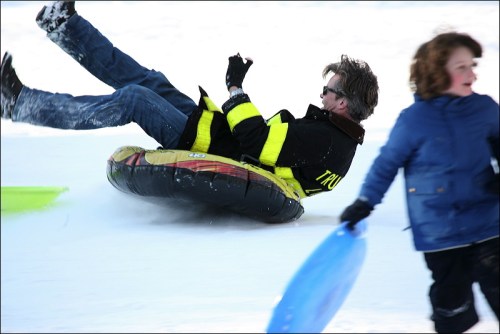 Winter fun in saucer 2 Central Park, New York City, saucer, sliding, wipe out