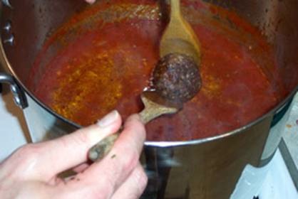 Sneaking a meatball from the pot